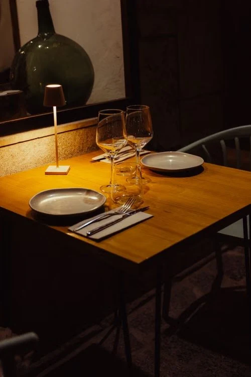 A public restaurant table set for a first meeting
